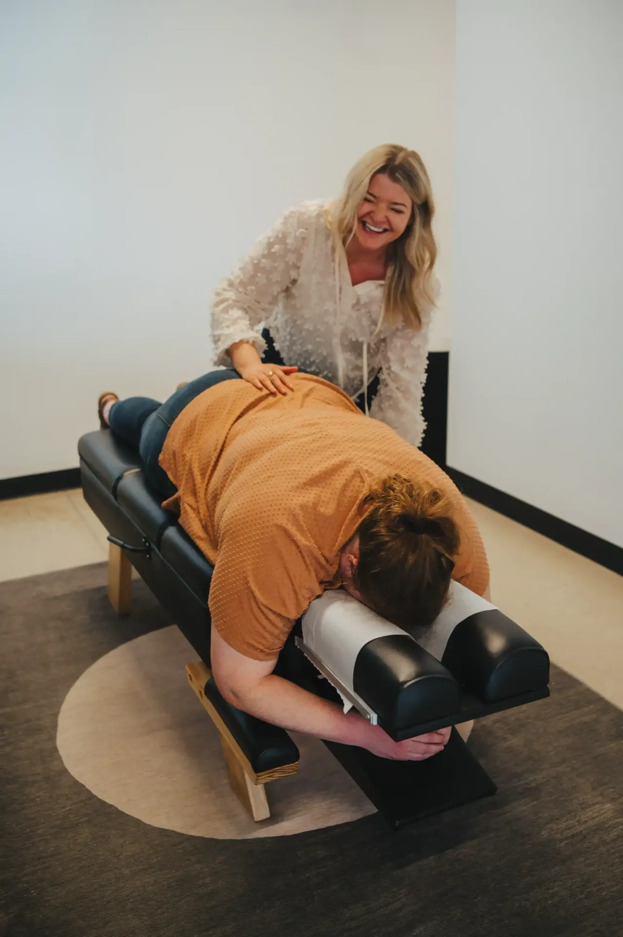 Dr. Mariah laughing with a practice member during care